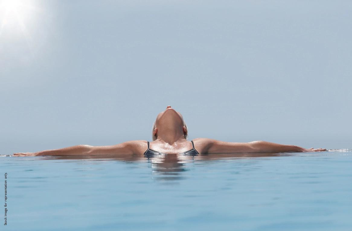 OLYMPIC LENGTH INFINITY POOL OVERLOOKING THE CENTRAL GREENSPACE​