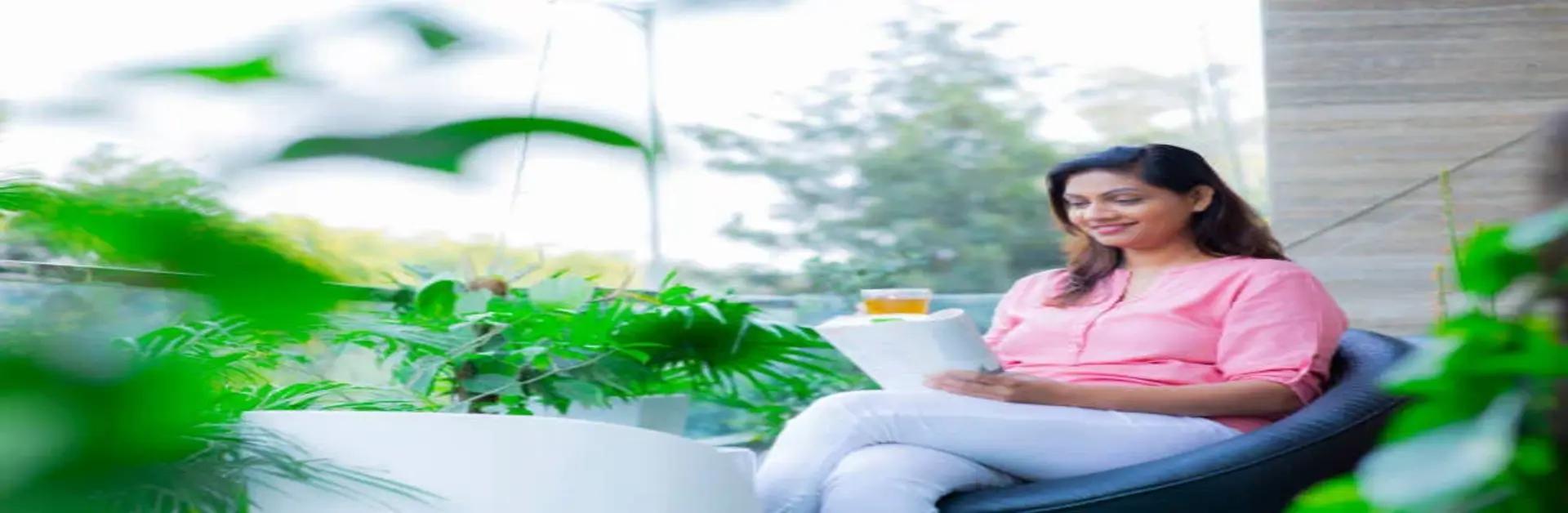 Lady sitting on balcony