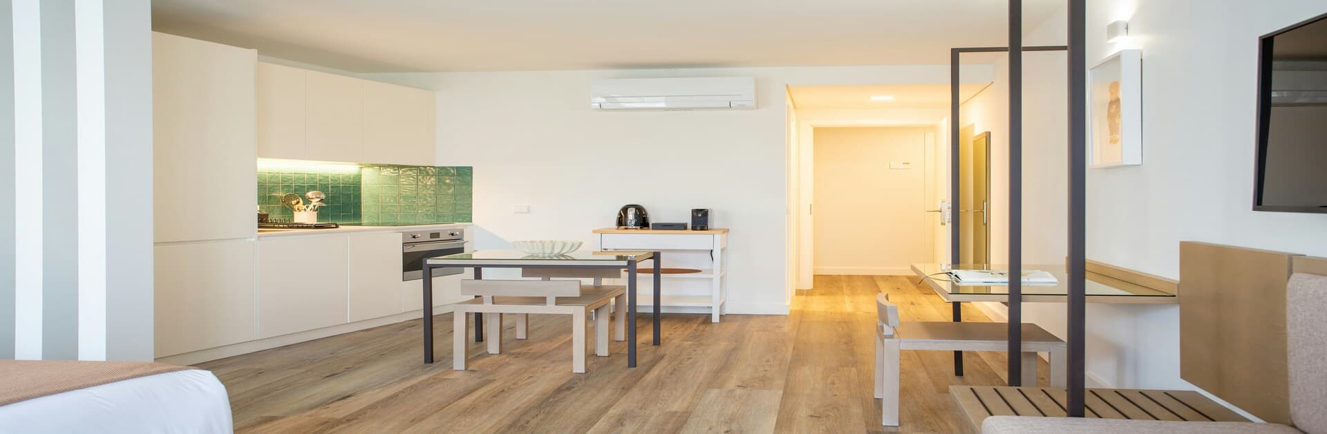 Compact luxury 2 BHK apartment with modern amenities and smart interior design.