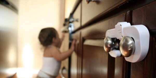 Child safe locks on kitchen cabinets